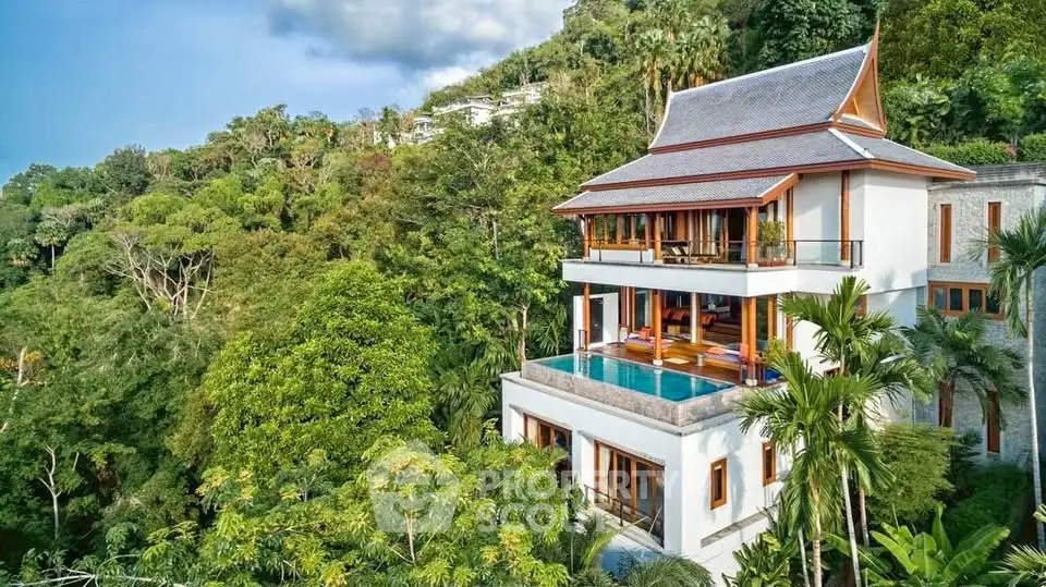 Luxurious tropical villa with private pool and stunning forest views, perfect for serene living.