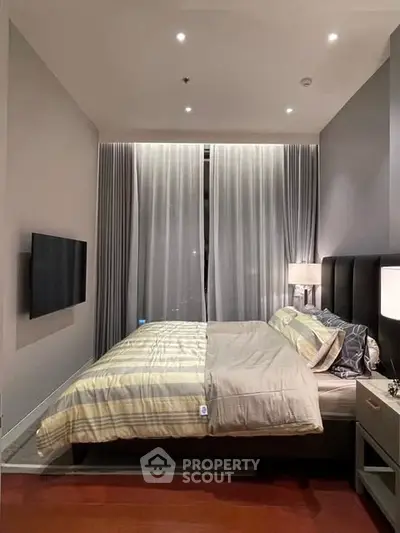 Luxurious modern bedroom with elegant decor and ambient lighting