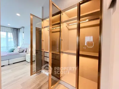 Luxurious bedroom with elegant walk-in closet and modern design