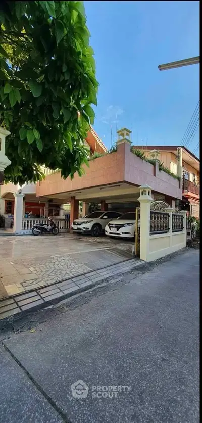 Charming residential property with spacious driveway and covered parking in a serene neighborhood.