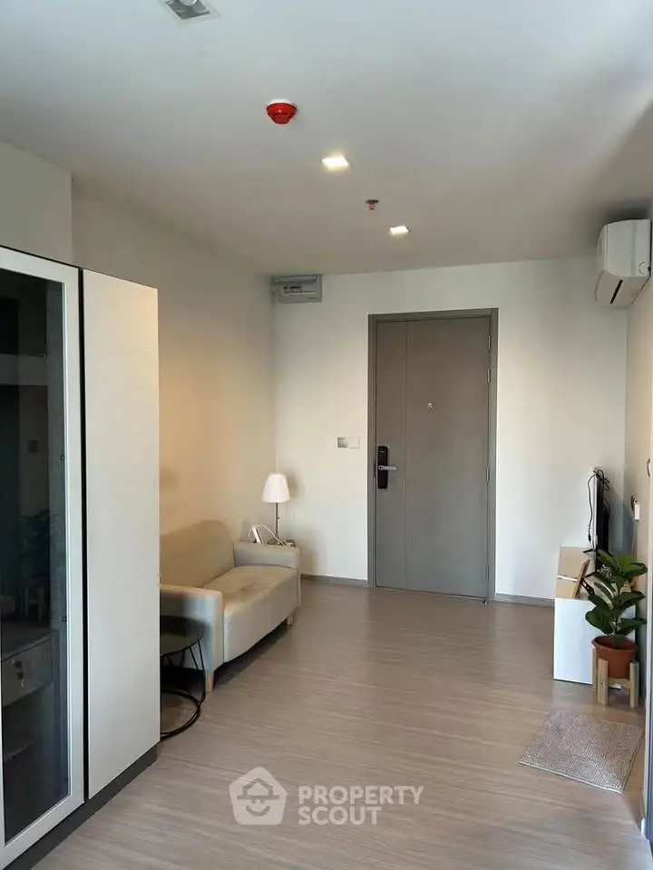 Modern living room with minimalist decor and sleek flooring