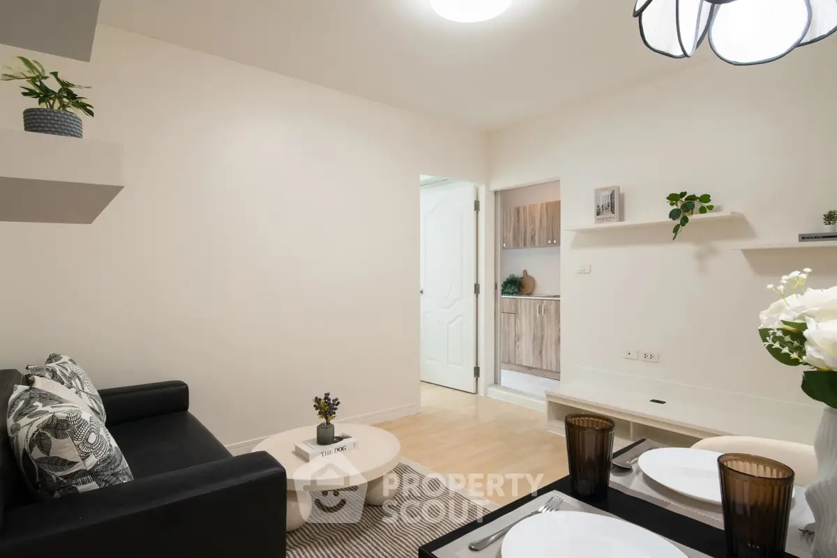 Modern living room with stylish decor and open layout, perfect for relaxation.