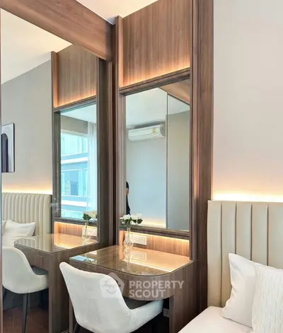 Elegant bedroom with modern vanity and ambient lighting