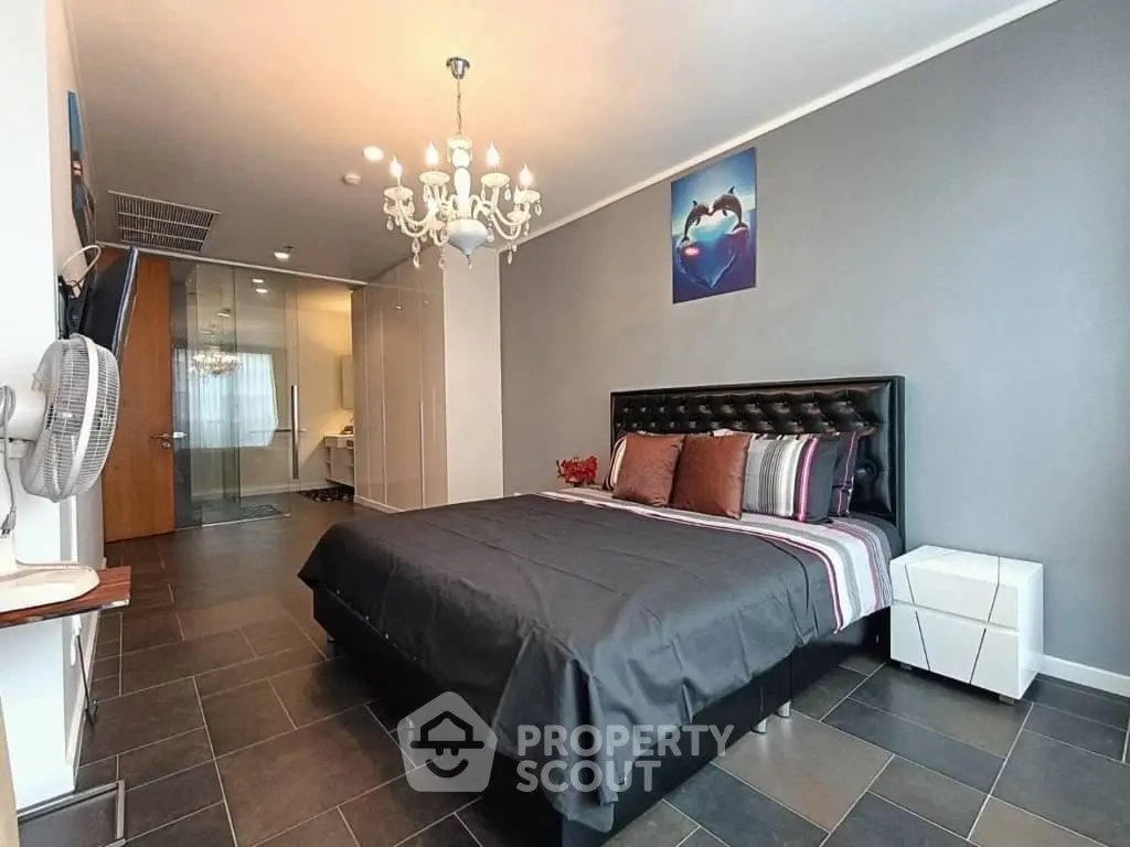 Luxurious bedroom with modern decor and stylish lighting