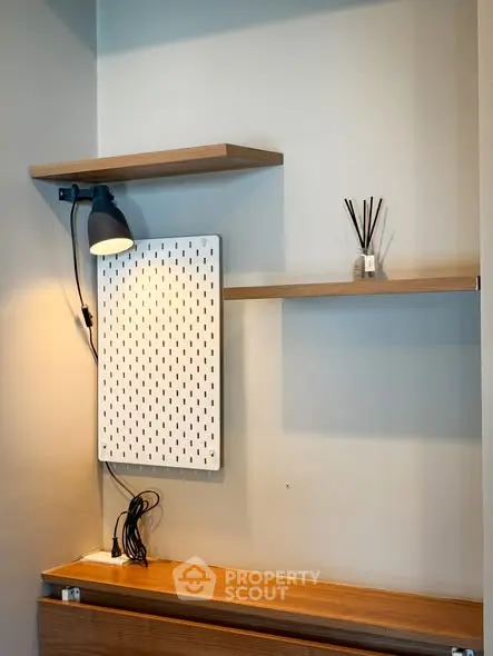 Modern study nook with sleek shelves and ambient lighting