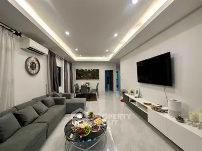 Spacious modern living room with elegant decor and dining area