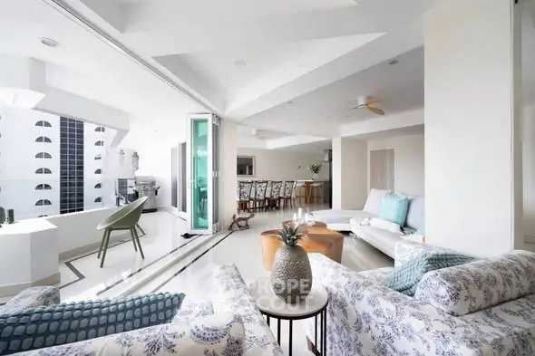 Spacious modern living room with open balcony and elegant decor