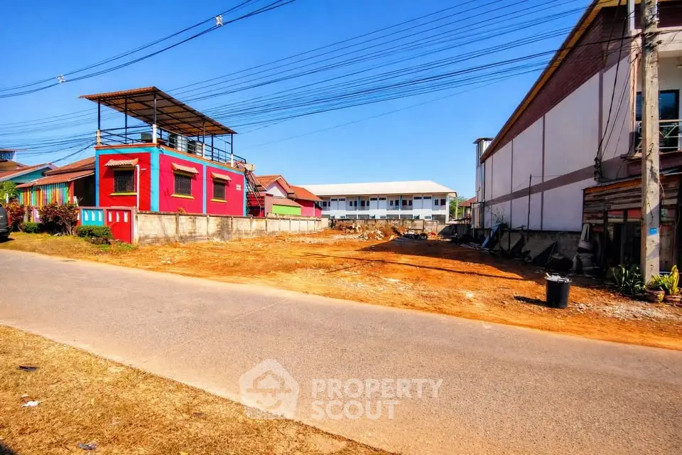 Vacant land plot with potential for development in a vibrant neighborhood.