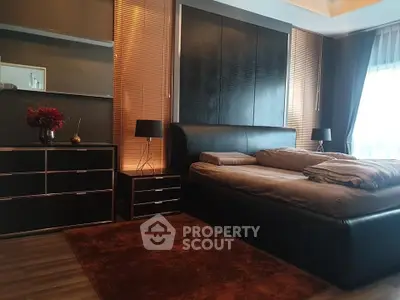 Luxurious modern bedroom with stylish decor and ambient lighting