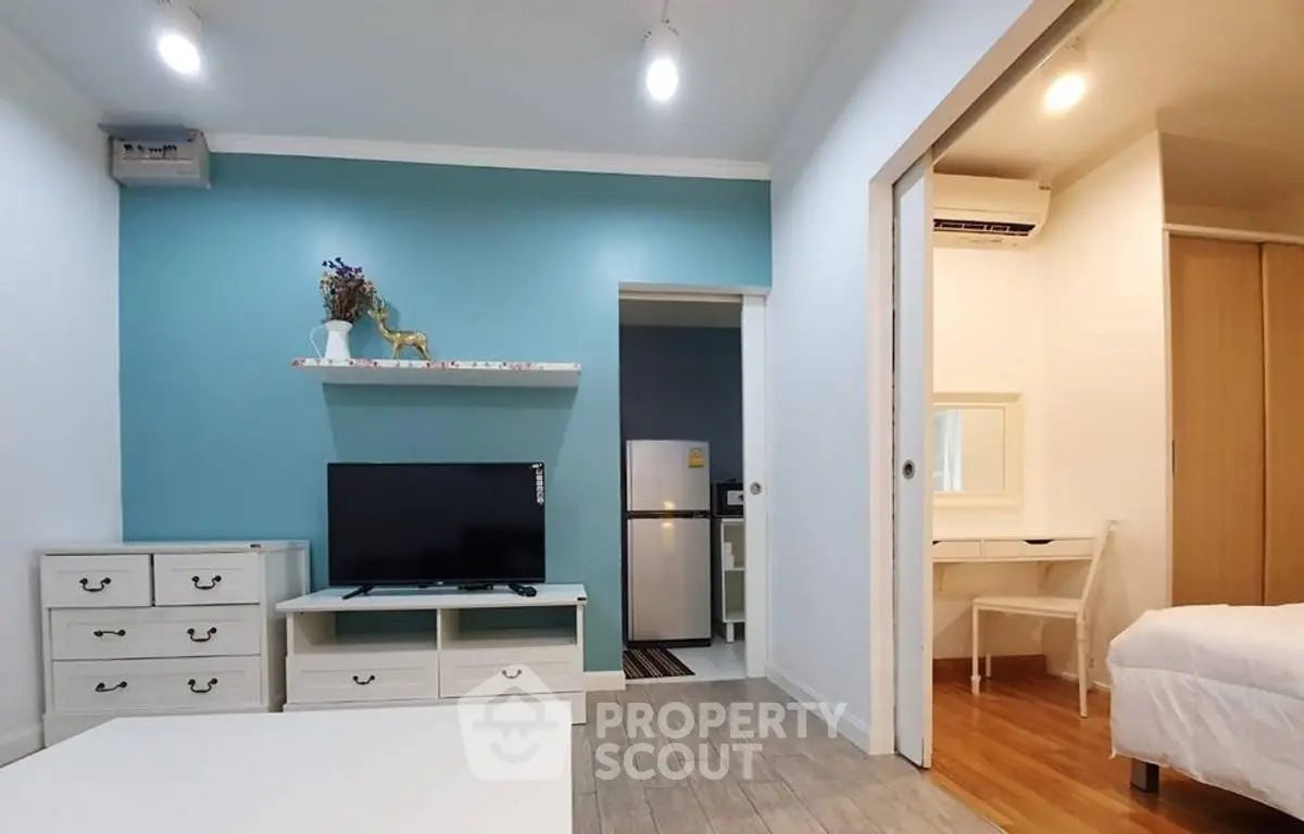 Charming modern living room with TV and stylish decor