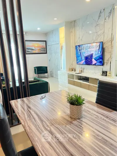 Luxurious modern living room with marble accents and stylish decor