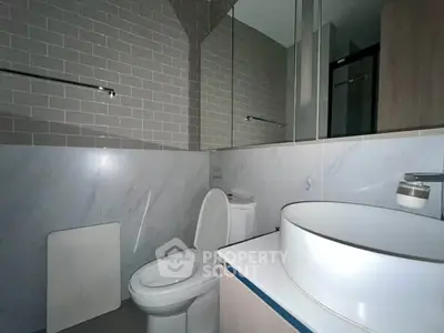 Modern bathroom with sleek fixtures and stylish tile design