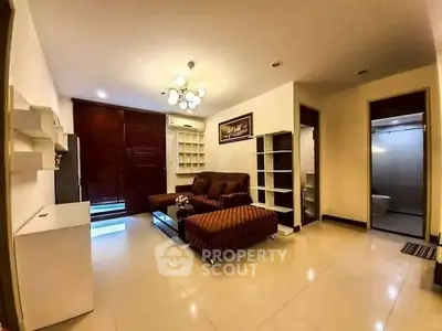 Spacious living room with modern furniture and elegant lighting