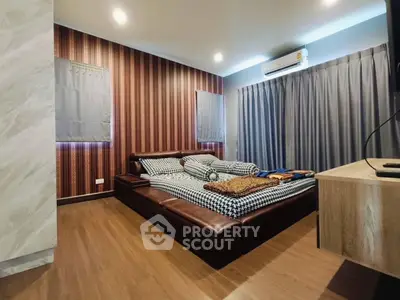 Modern bedroom with stylish decor and cozy atmosphere