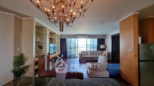Luxurious living room with ocean view and elegant chandelier