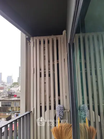 Urban balcony view with cityscape and modern railing design