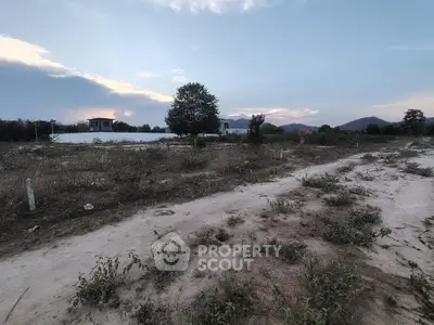 Expansive plot of land with scenic mountain views, perfect for development opportunities.