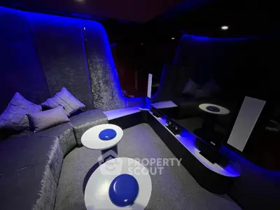 Luxurious modern living room with plush seating and ambient lighting