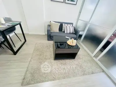 Modern living room with cozy sofa and stylish decor