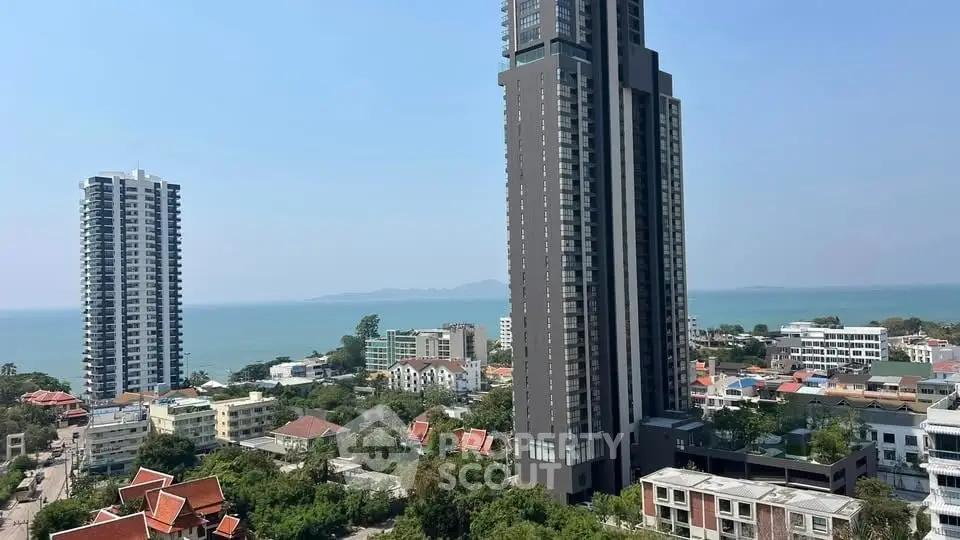 Stunning high-rise building with ocean view in vibrant cityscape