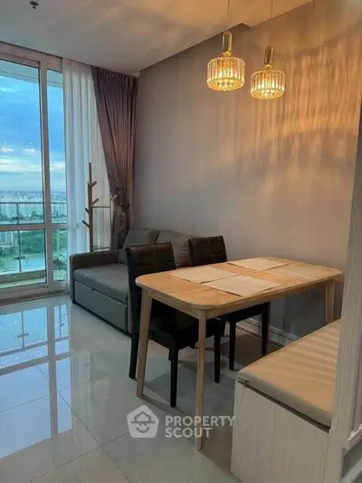 Modern living room with elegant dining area and stunning city view from large windows.