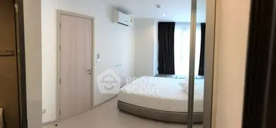 Modern bedroom with large window and minimalist decor