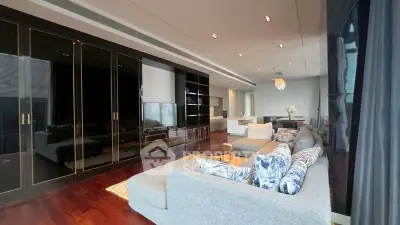 Luxurious modern living room with elegant decor and open kitchen layout