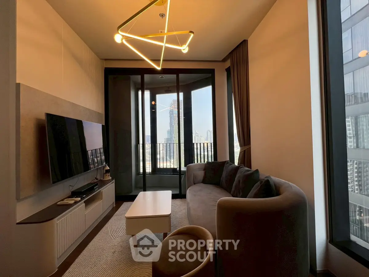Modern living room with stylish lighting and city view balcony