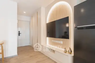 Modern living room with sleek TV setup and stylish decor