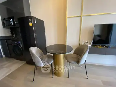 Modern apartment interior with stylish dining area and sleek appliances