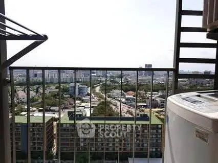 Stunning cityscape view from a high-rise balcony with modern amenities.