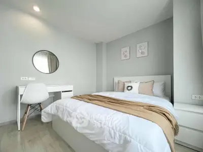 Modern bedroom with stylish decor and cozy ambiance