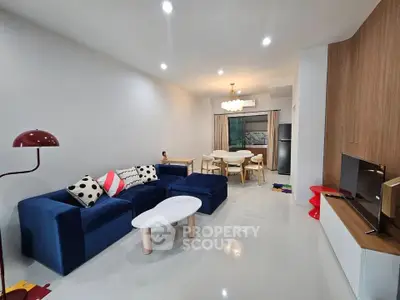 Spacious modern living room with stylish furniture and open layout