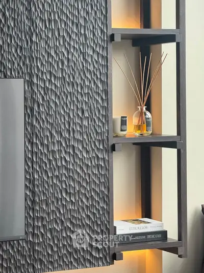 Modern interior design with textured wall panel and stylish shelving
