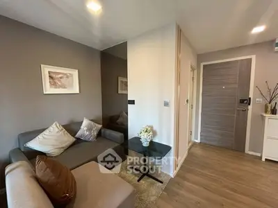 Modern living room with cozy sofa and stylish decor