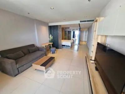 Spacious modern living room with open layout and cozy furniture