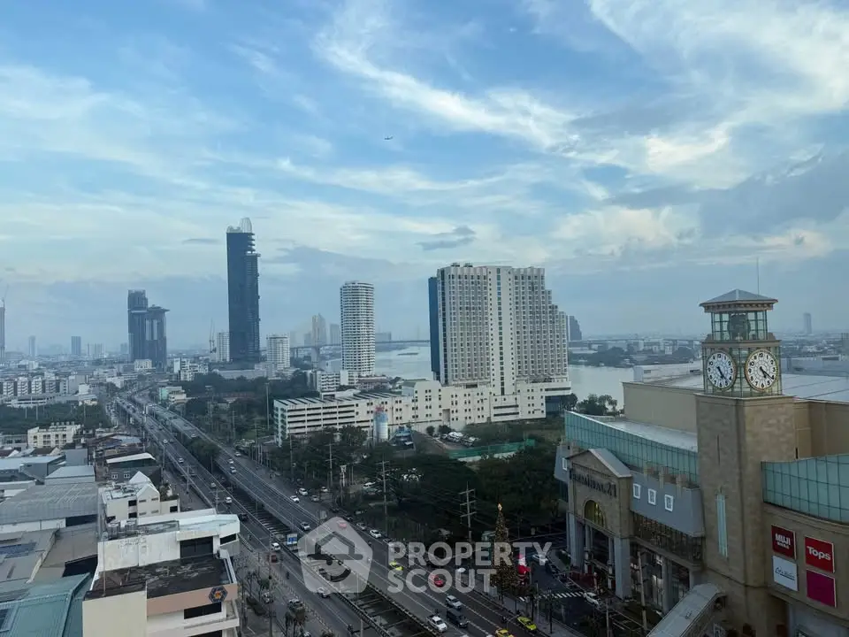 Stunning cityscape view with modern high-rise buildings and clear blue sky.