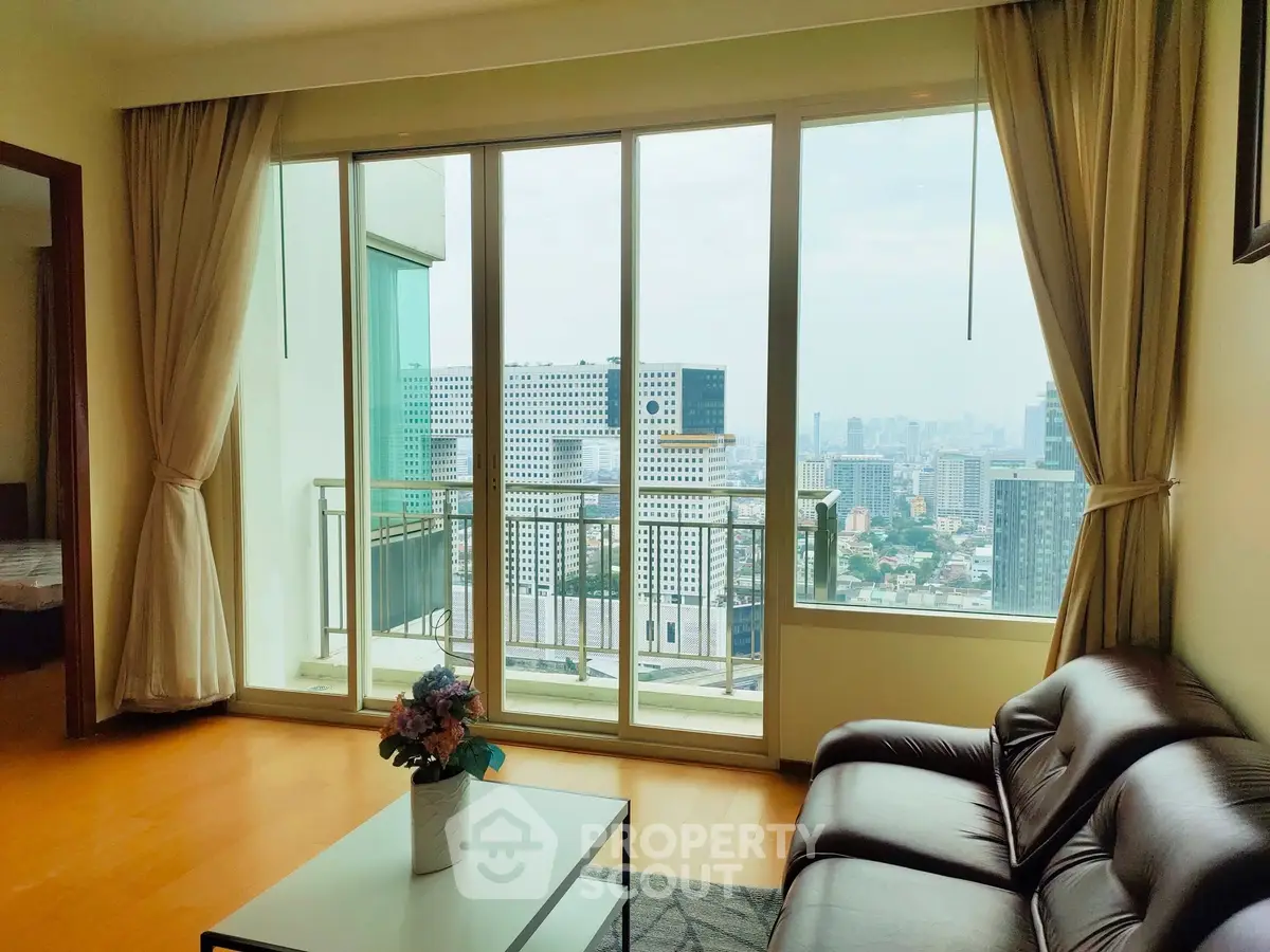 Spacious living room with stunning city view and elegant decor