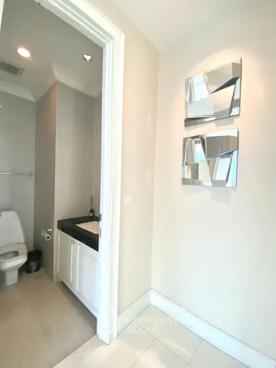 Modern bathroom with sleek design and contemporary fixtures in a luxury home.