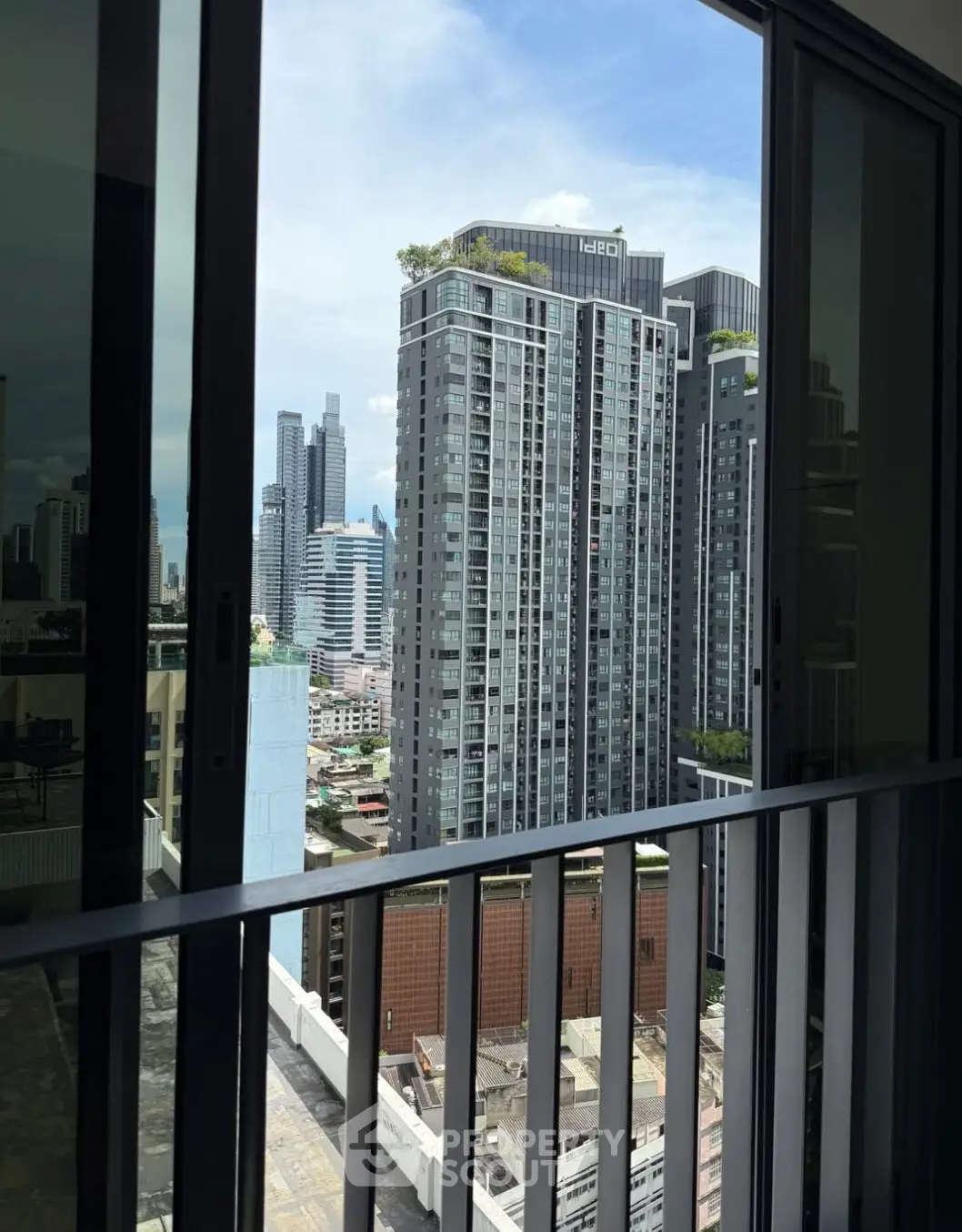 Stunning cityscape view from modern apartment balcony