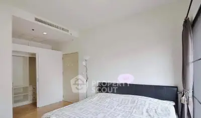 Bright minimalist bedroom with built-in closet and modern decor