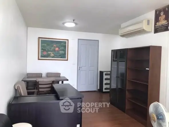 Cozy living room with modern furniture and air conditioning