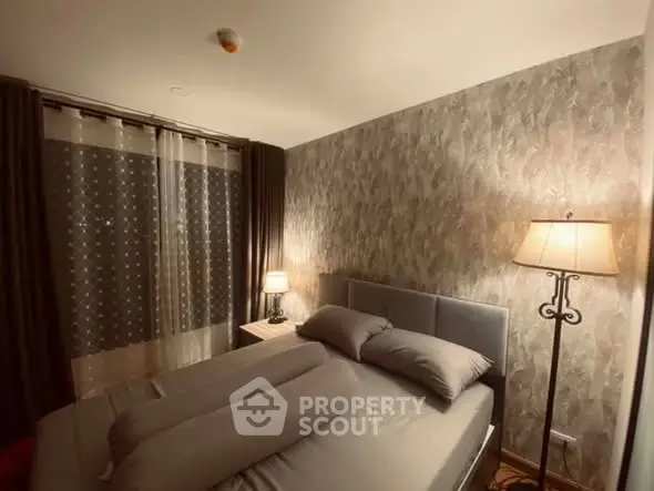 Cozy bedroom with elegant lighting and modern decor