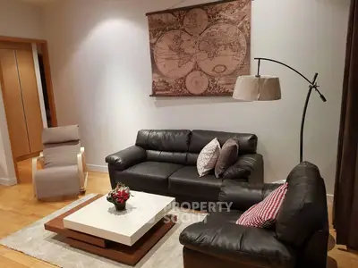 Stylish living room with leather sofas and modern decor