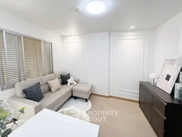 Modern living room with stylish decor and cozy seating area