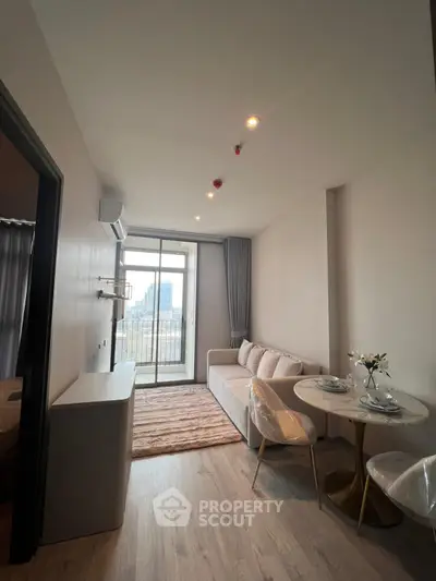 Modern living room with balcony view in a stylish apartment