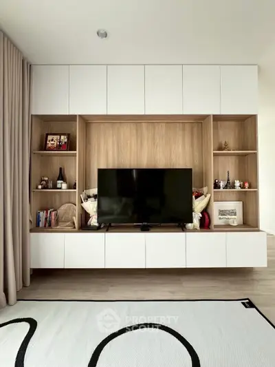 Modern living room with sleek TV unit and stylish decor