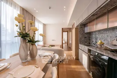 Luxurious modern kitchen with open layout and elegant dining area