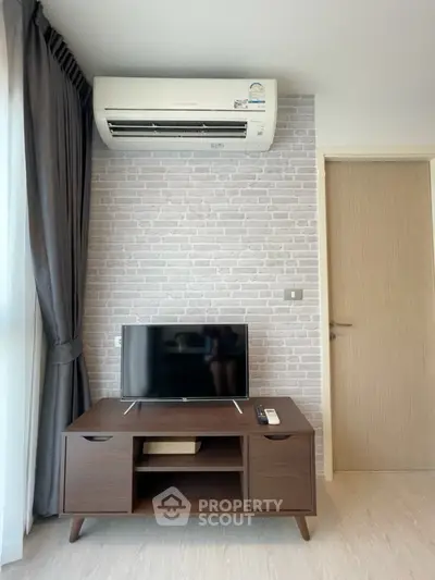 Modern living room with air conditioning and stylish TV stand