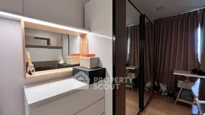 Modern bedroom with stylish storage and elegant decor